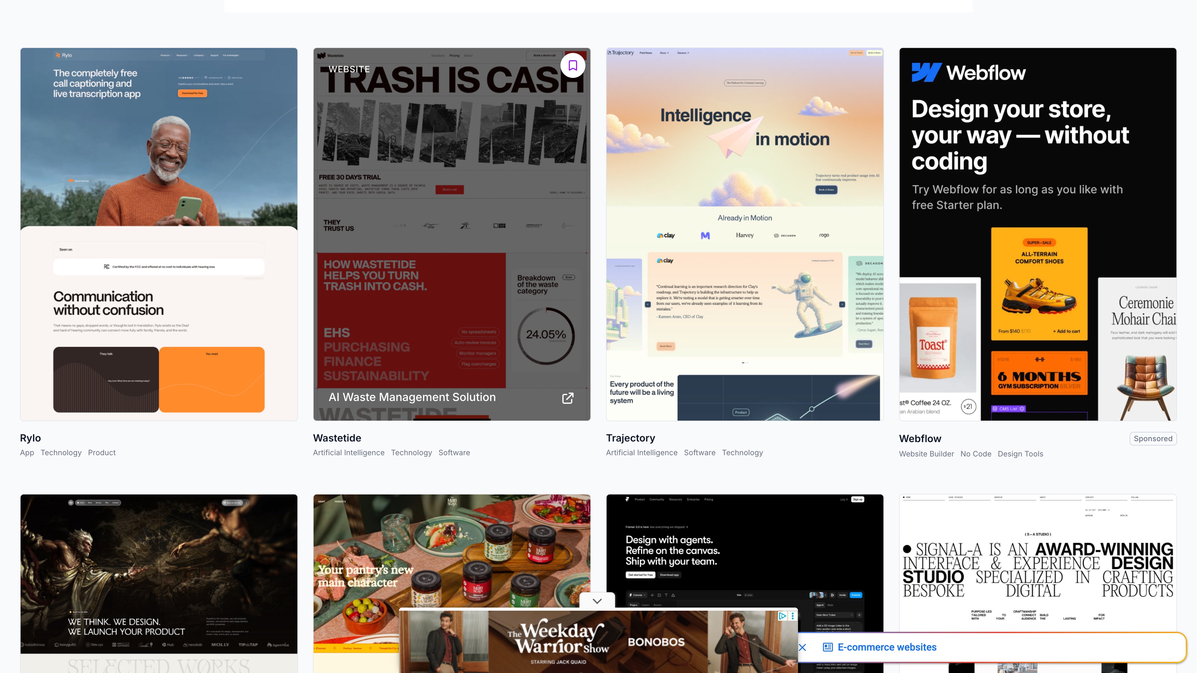 The "Latest Web Design Inspiration" grid on the homepage: each card is a full-page screenshot with the site name and category tags; sponsored cards carry a Sponsored label